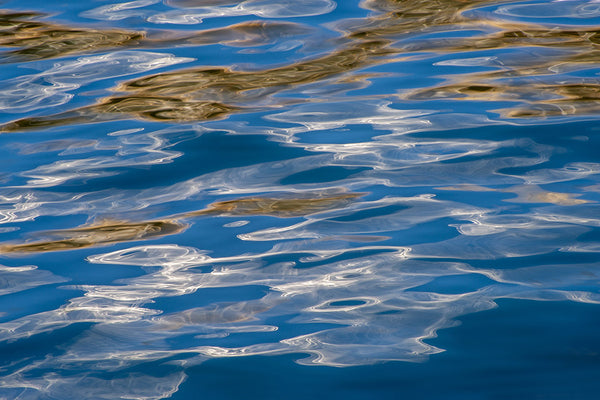 ocean reflections in blue and white