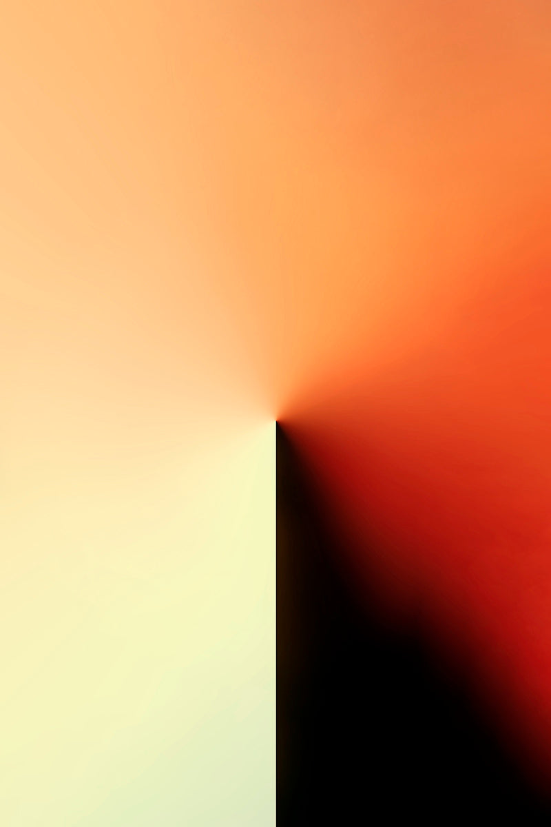 Abstract gradient artwork with a vertical split: pale cream on the left blending into warm peach and orange, with a dark red area on the right and a black triangular shape at the bottom center.