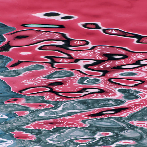 pink reflections on the surface of the sea