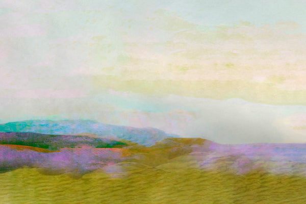 An abstract landscape painting featuring soft, blended hills in muted shades of yellow-green, purple, blue, and peach under a pale sky.