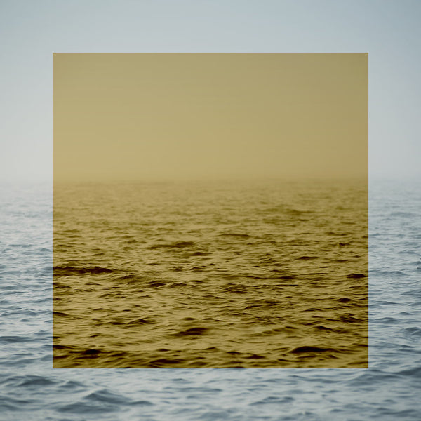 gold colour gradient over ocean artwork