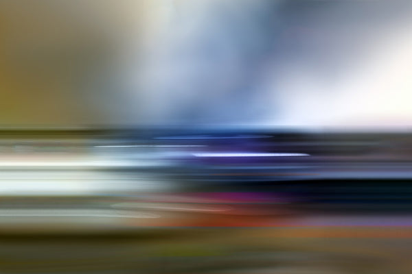 Abstract blurred image with multicolor streaks on a gradient background