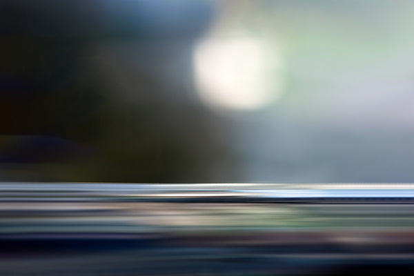 Abstract blurred image with a bright light source